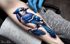 What Does a Blue Jay Tattoo Symbolize? Intelligence!